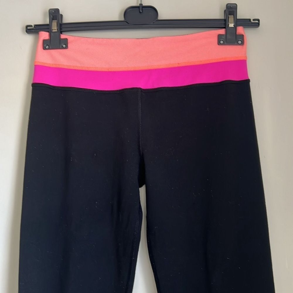 LULULEMON BLACK REVERSIBLE PINK/ORANGE YOGA PANTS - Picture 2 of 6